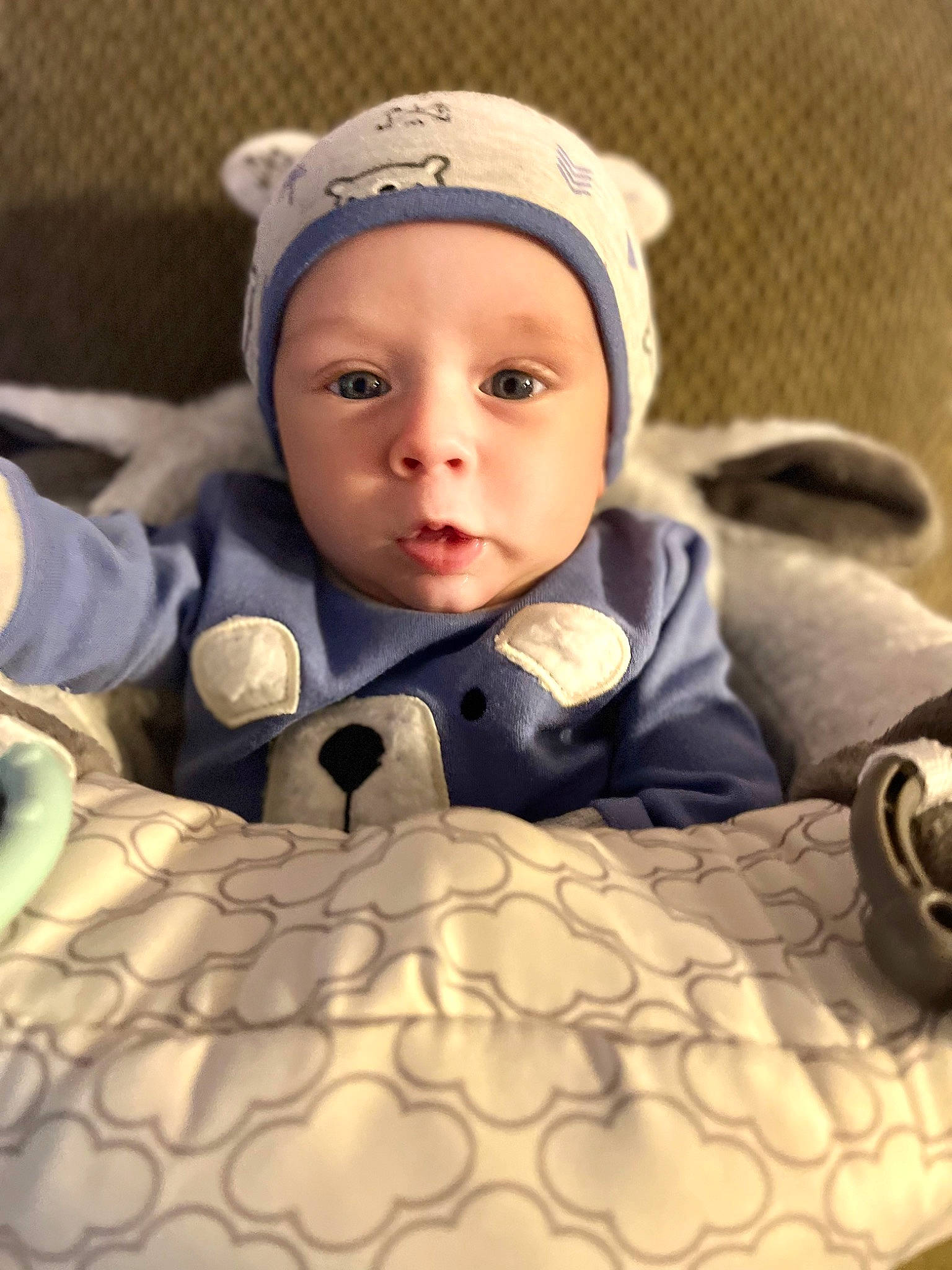 Beau joined the competition — help win amazing prizes! baby, baby_toddler_clothing, bedding, cap, cheek, child, comfort, flash_photography, fun, happy, headwear, iris, linens, mammal, pattern, person, room, sitting, skin, toddler