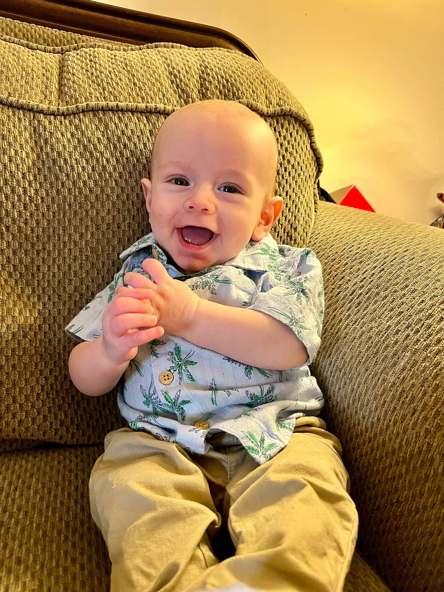 Beau joined the competition — help win amazing prizes! baby, baby_laughing, baby_toddler_clothing, cheek, child, comfort, couch, eye, flash_photography, fun, happy, iris, pattern, person, portrait_photography, sitting, skin, sleeve, smile, textile