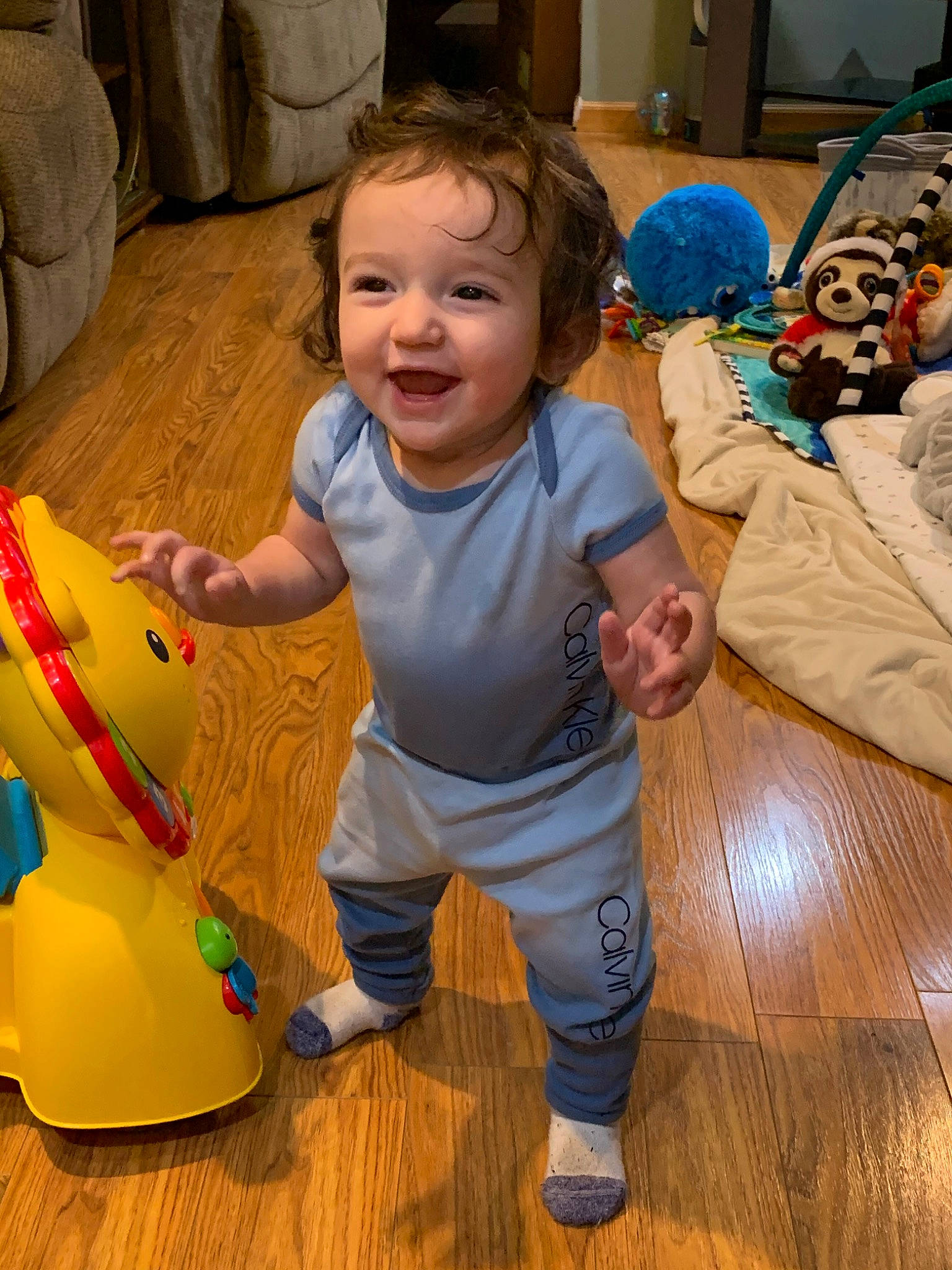 Jacob joined the competition — help win amazing prizes! baby, child, floor, flooring, fun, hardwood, joy, person, play, room, toddler, toy, wood