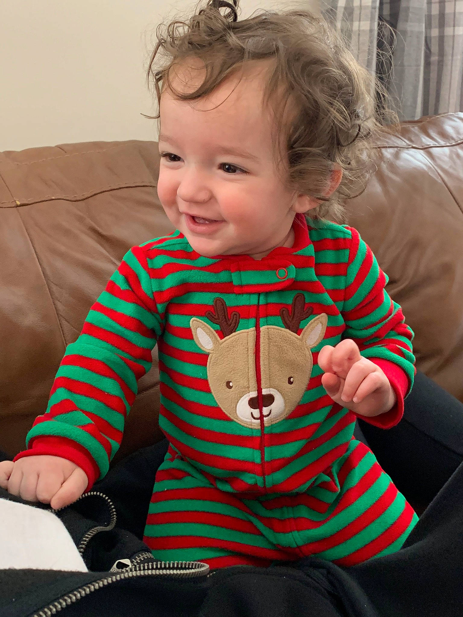 Jacob is registered to the contest to win money with this photo: baby, baby_products, baby_toddler_clothing, cheek, child, ear, face, head, joy, outerwear, person, play, product, sitting, skin, sleeve, sweater, t_shirt, toddler, toy
