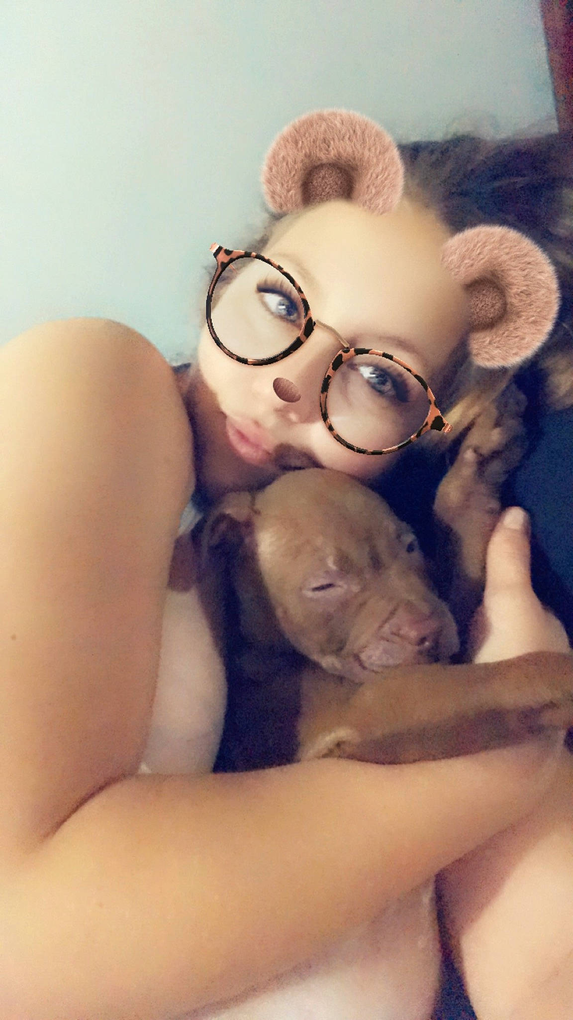 Brutus is registered to the contest to win money with this photo: comfort, eye, eyebrow, eyelash, eyewear, fawn, finger, flash_photography, gesture, glasses, hair, hand, happy, head, human_body, jaw, neck, selfie, toy, vision_care