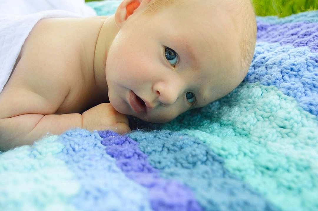 Killian joined the competition — help win amazing prizes! baby, cheek, child, close_up, eye, face, head, lip, mouth, nose, person, skin, smile, toddler, tummy_time