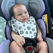 Olive is registered to the contest to win money with this photo: baby, car, car_interior, carseat, crib, cushion, face, furniture, happy, head, homedecor, infantbed, newborn, person, photography, portrait, sleeping, smile, transportation, vehicle