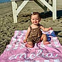 Emelia joined the competition — help win amazing prizes! baby, beach, child, cute, daylight, dress, foot, hair_bow, happy, leg, outdoor, person, portrait, sand, shadow, sitting, smiling, sunny, towel, wooden_chair