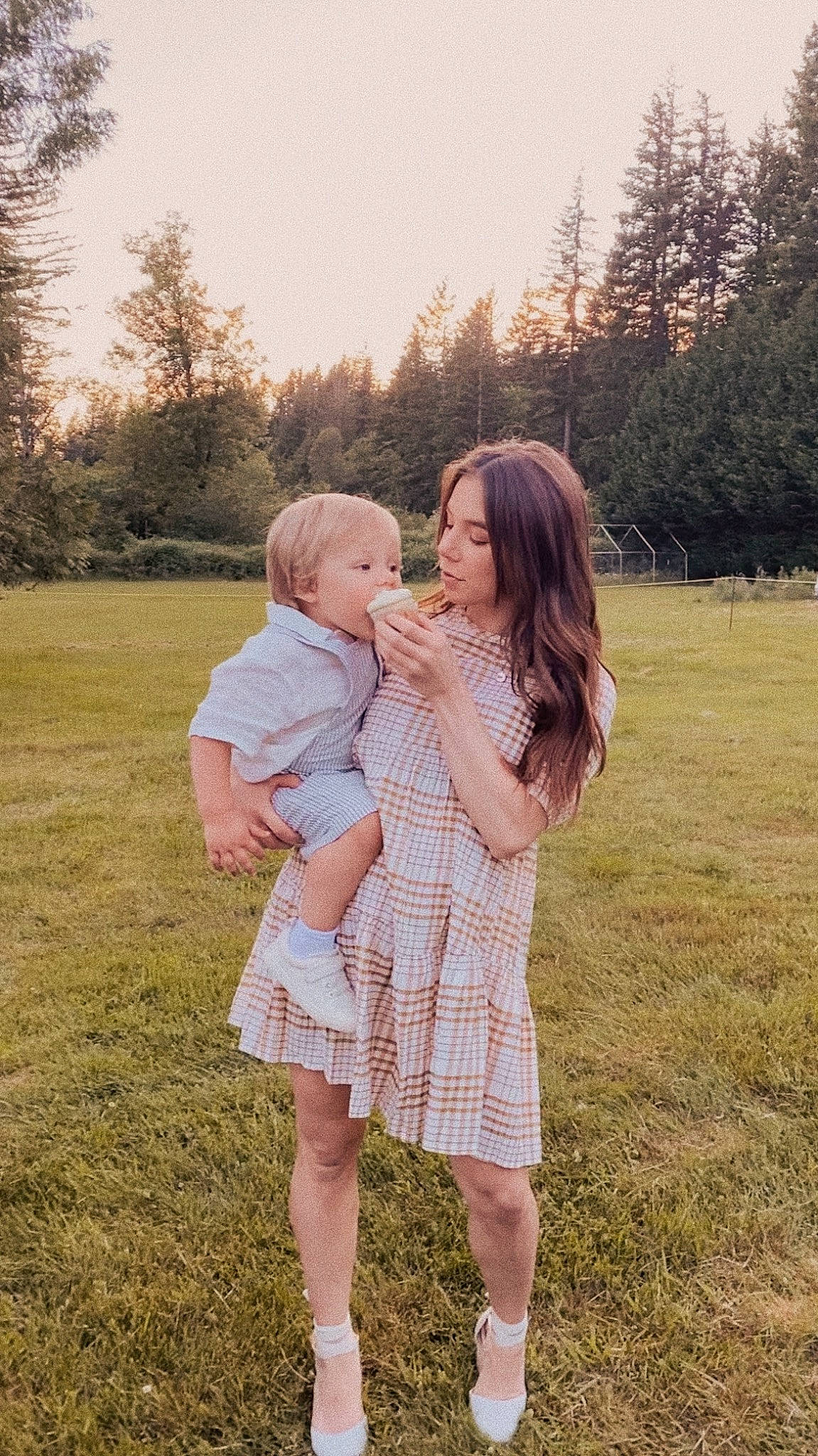 Hendrix is registered to the contest to win money with this photo: baby, blond, child, flash_photography, fun, gesture, grass, grassland, hand, happy, interaction, mammal, meadow, people, people_in_nature, person, plant, sky, sunlight, toddler