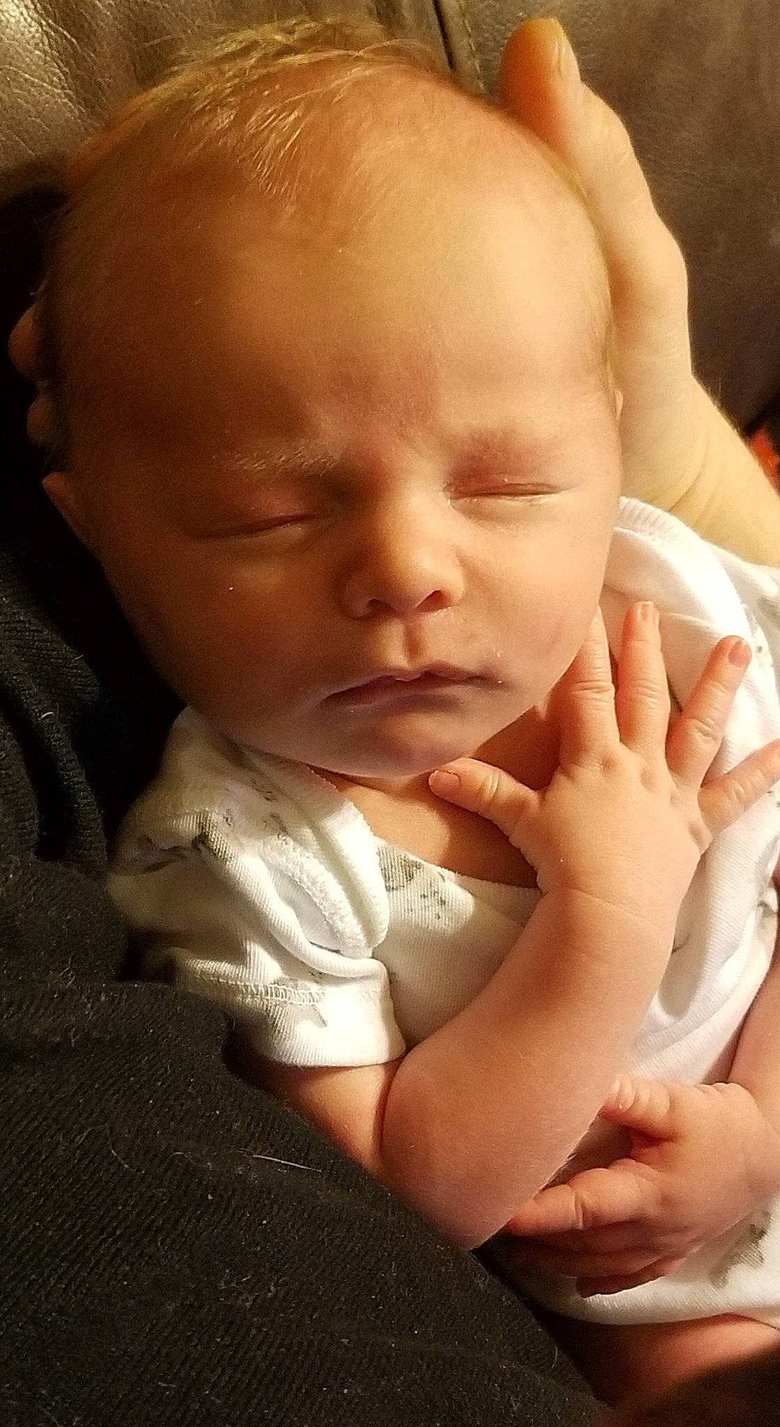 Jaymes is registered to the contest to win money with this photo: baby, cheek, child, chin, ear, face, finger, forehead, hand, head, lip, mouth, nose, person, skin, thumb, toddler