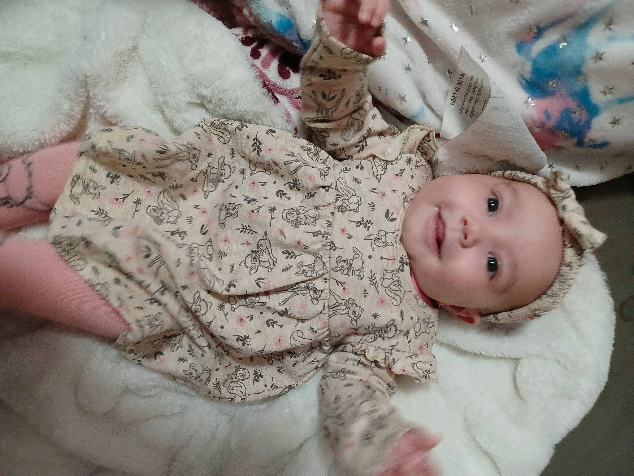 Paisleigh joined the competition — help win amazing prizes! baby, baby_products, baby_toddler_clothing, cheek, child, comfort, fur, happy, head, headwear, joy, linens, nail, pattern, person, pink, room, sitting, skin, sleeve