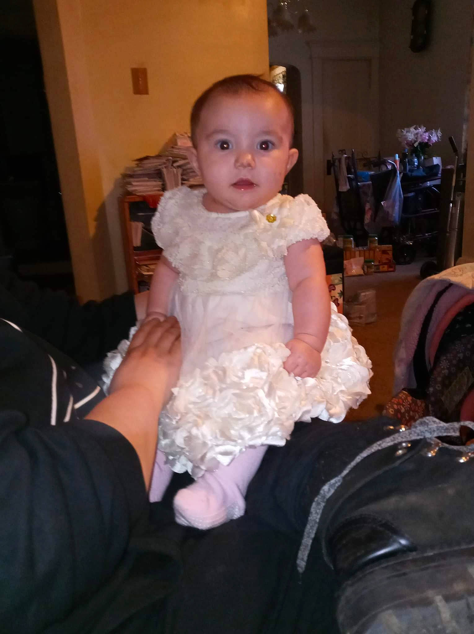 Paisleigh joined the competition — help win amazing prizes! baby, baby_toddler_clothing, chair, cheek, day_dress, dress, embellishment, event, flash_photography, formal_wear, fun, hairstyle, hand, happy, human_leg, iris, lap, person, sitting, textile