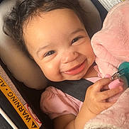 baby, bodypart, car, car_interior, carseat, cushion, face, finger, hand, happy, head, homedecor, mouth, newborn, person, photography, portrait, smile, transportation, vehicle