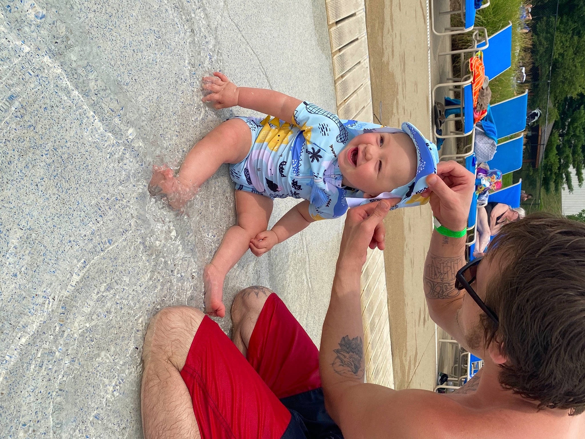 Dezmond joined the competition — help win amazing prizes! baby, barefoot, child, electric_blue, event, foot, fun, happy, headwear, human_leg, human_settlement, leisure, person, play, public_space, recreation, sand, shorts, thigh, toddler