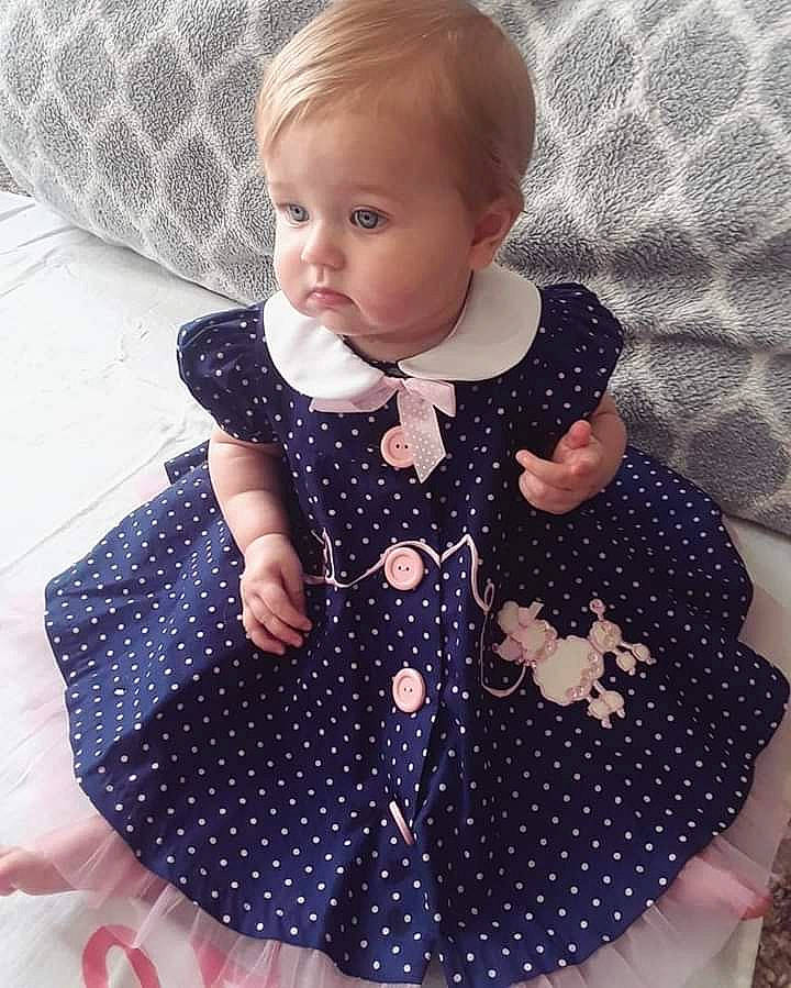 Kataleya joined the competition — help win amazing prizes! baby, baby_toddler_clothing, child, clothing, dance, design, dress, neck, outerwear, pattern, person, polka_dot, product, sleeve, textile, toddler