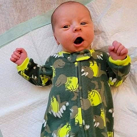 Brice is registered to the contest to win money with this photo: baby, baby_products, baby_safety, baby_sleeping, baby_toddler_clothing, cheek, child, comfort, eye, face, happy, linens, nose, outerwear, pattern, person, product, sleeve, t_shirt, textile