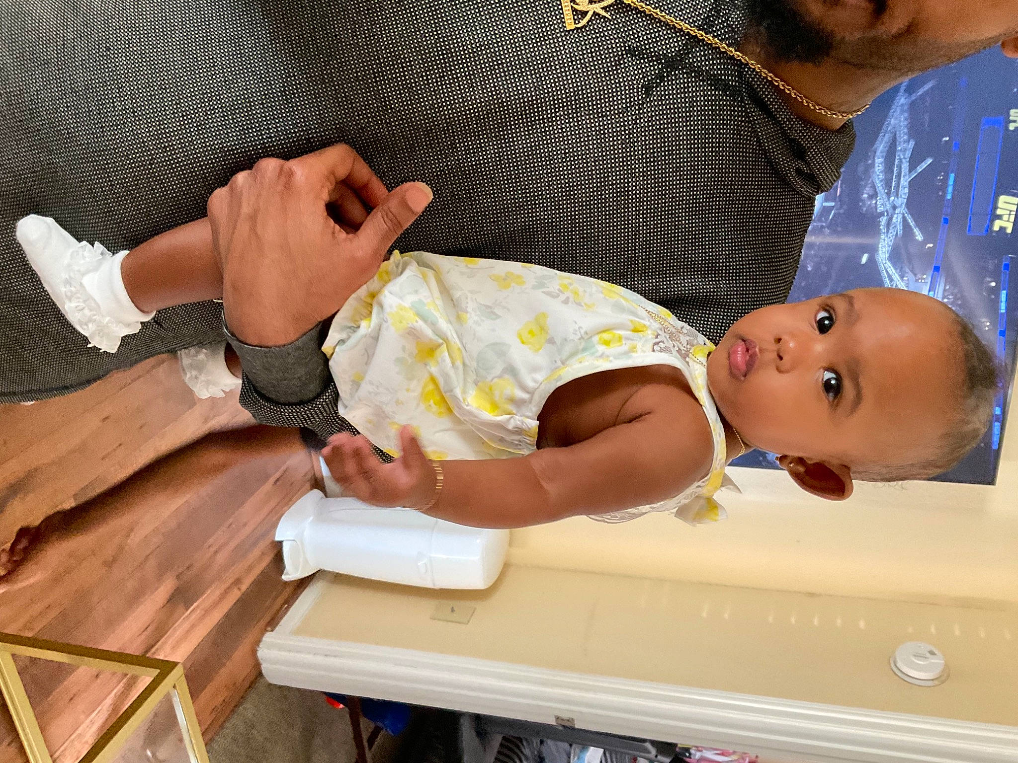 Iyanna joined the competition — help win amazing prizes! abdomen, baby, baby_products, baby_safety, baby_toddler_clothing, chest, child, comfort, diaper, event, finger, gesture, human_body, human_leg, joint, person, thigh, thumb, toddler, wood