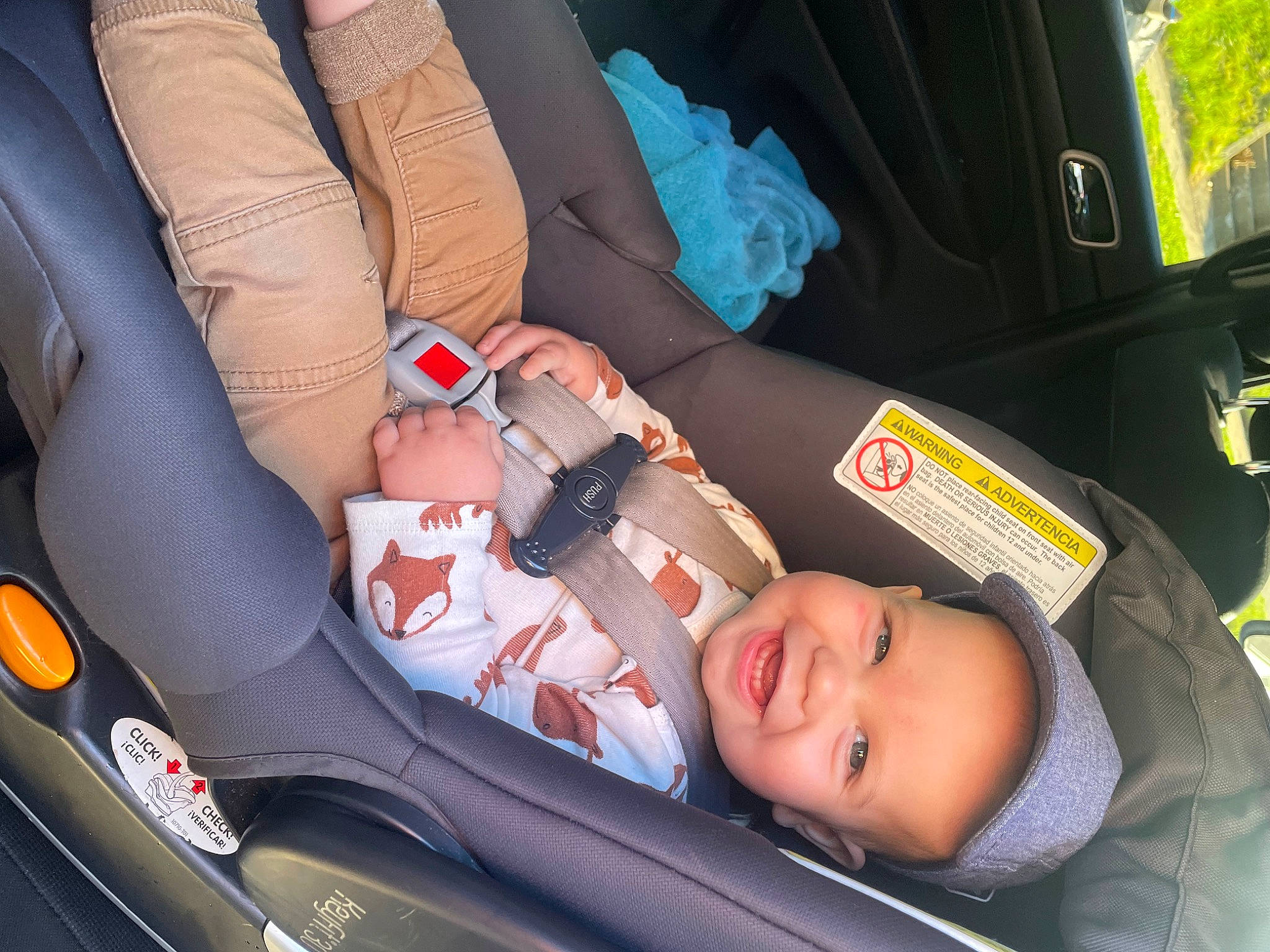 Dawson is registered to the contest to win money with this photo: auto_part, automotive_design, baby, baby_carriage, baby_products, car_seat, car_seat_cover, carmine, child, comfort, electric_blue, family_car, finger, headwear, human_leg, motor_vehicle, person, product, service, smile