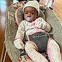 Nevaeh joined the competition — help win amazing prizes! baby, infant, pacifier, hat, mittens, baby_seat, floral_pattern, wooden_floor, clothing, cute, indoors, person, child, relaxing, pink, grey, white, seatbelt, baby_trend, comfort