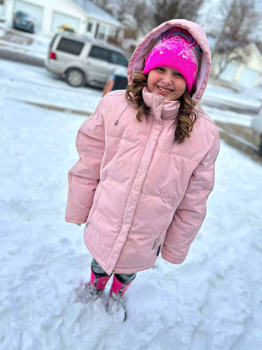 Raelynn joined the competition — help win amazing prizes! cap, car, child, clothing, freezing, fun, headgear, headwear, jacket, joy, magenta, outerwear, person, pink, recreation, sleeve, smile, snow, textile, tire