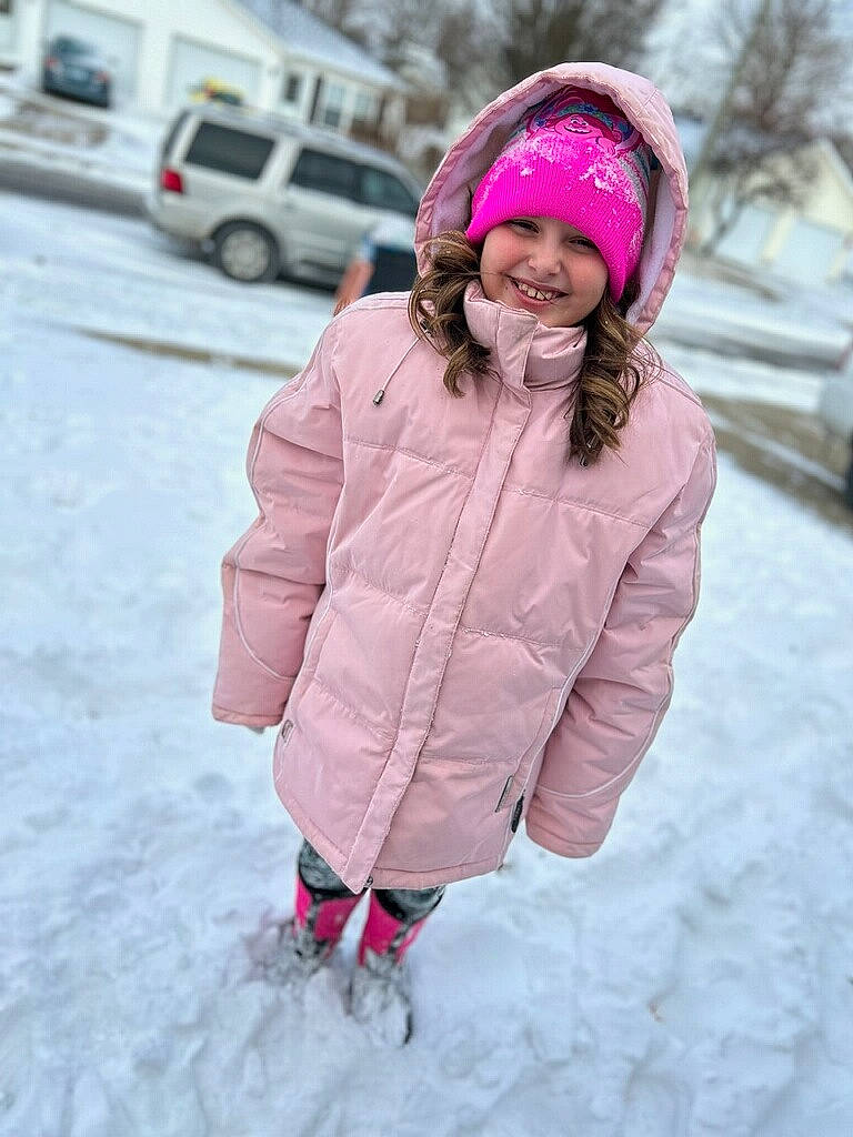 Raelynn joined the competition — help win amazing prizes! cap, car, child, clothing, face, freezing, headgear, headwear, jacket, joy, magenta, outerwear, parka, person, pink, recreation, sleeve, smile, snow, textile
