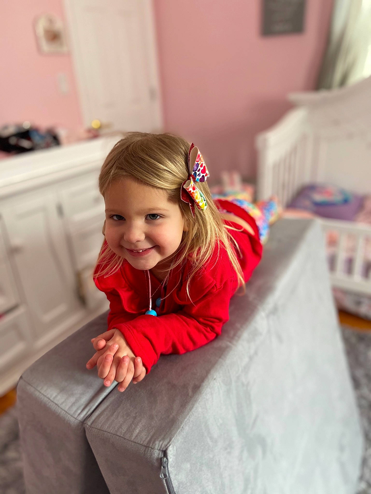 Kayla joined the competition — help win amazing prizes! blond, child, comfort, drawer, dress, event, face, floor, flooring, fun, hair, happy, head, joy, laugh, magenta, person, play, room, sitting