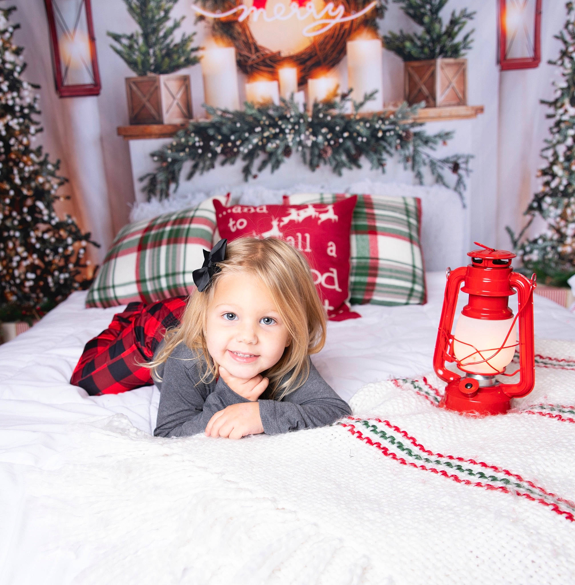 Kayla is registered to the contest to win money with this photo: christmas_decoration, christmas_ornament, comfort, dress, happy, holiday_ornament, human_body, interior_design, joy, light, lighting, living_room, ornament, person, plaid, plant, red, smile, tartan, textile