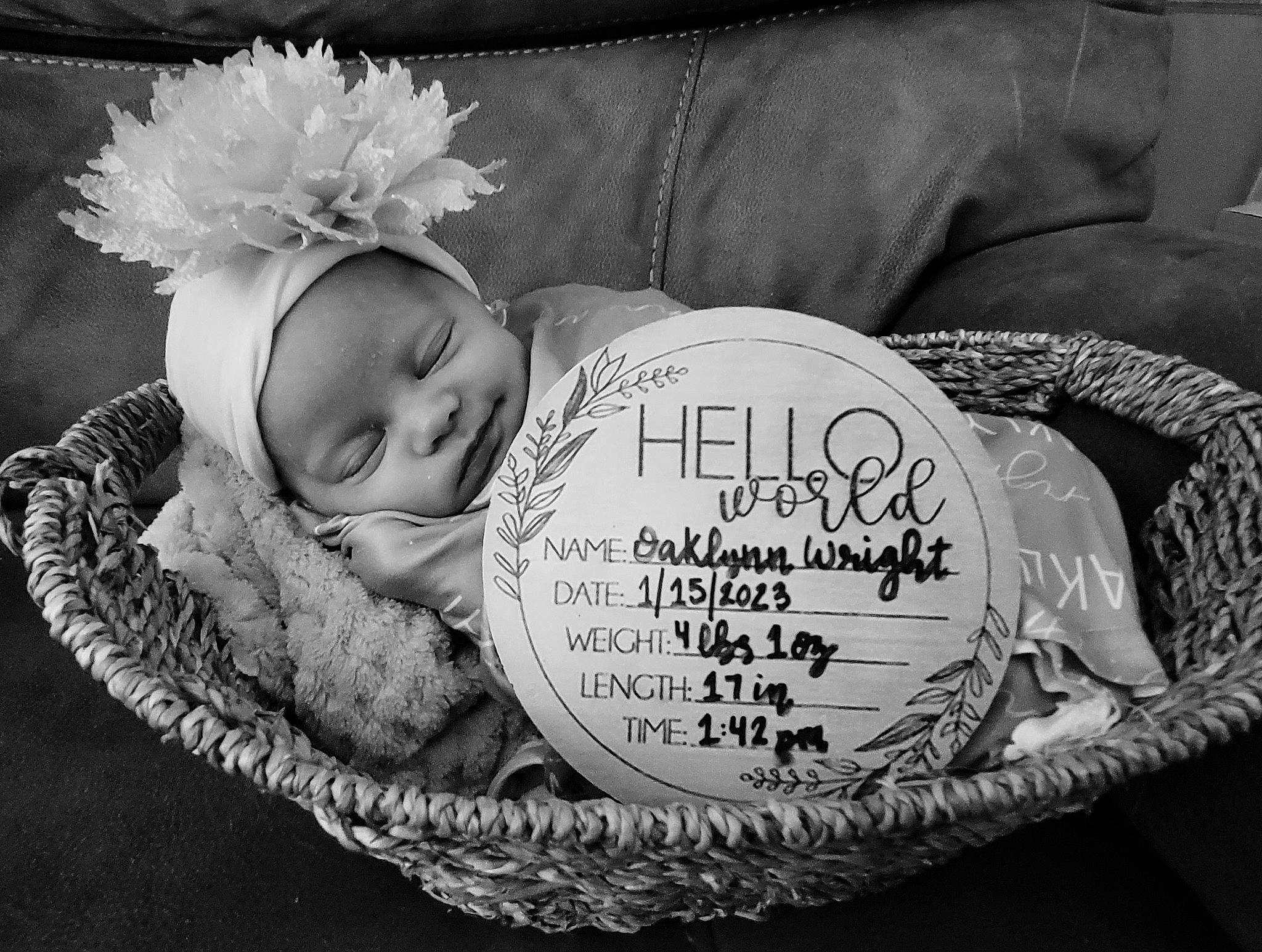 Oaklynn joined the competition — help win amazing prizes! baby, baby_toddler_clothing, basket, black, child, comfort, eye, fashion_accessory, flash_photography, font, grass, hand, happy, headgear, headpiece, headwear, monochrome, monochrome_photography, person, sitting