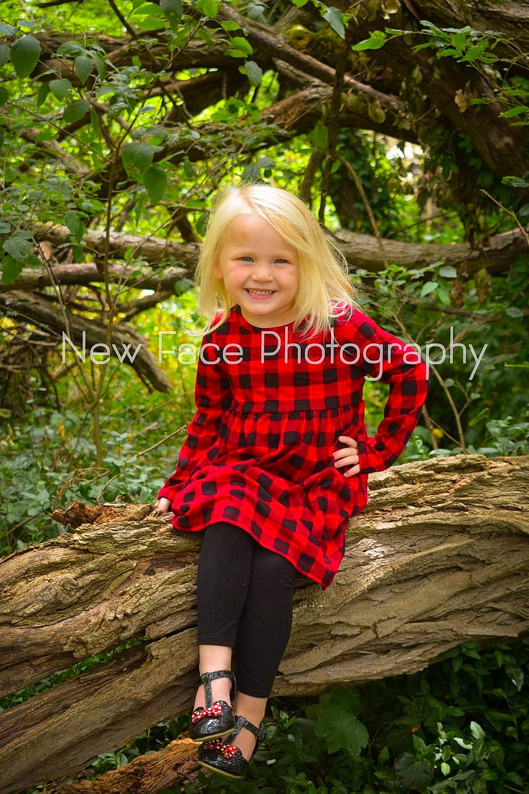 Kellianne is registered to the contest to win money with this photo: blond, botany, child, child_model, clothing, design, dress, joy, leaf, long_hair, outerwear, pattern, people_in_nature, person, photo_shoot, photography, plaid, plant, red, textile