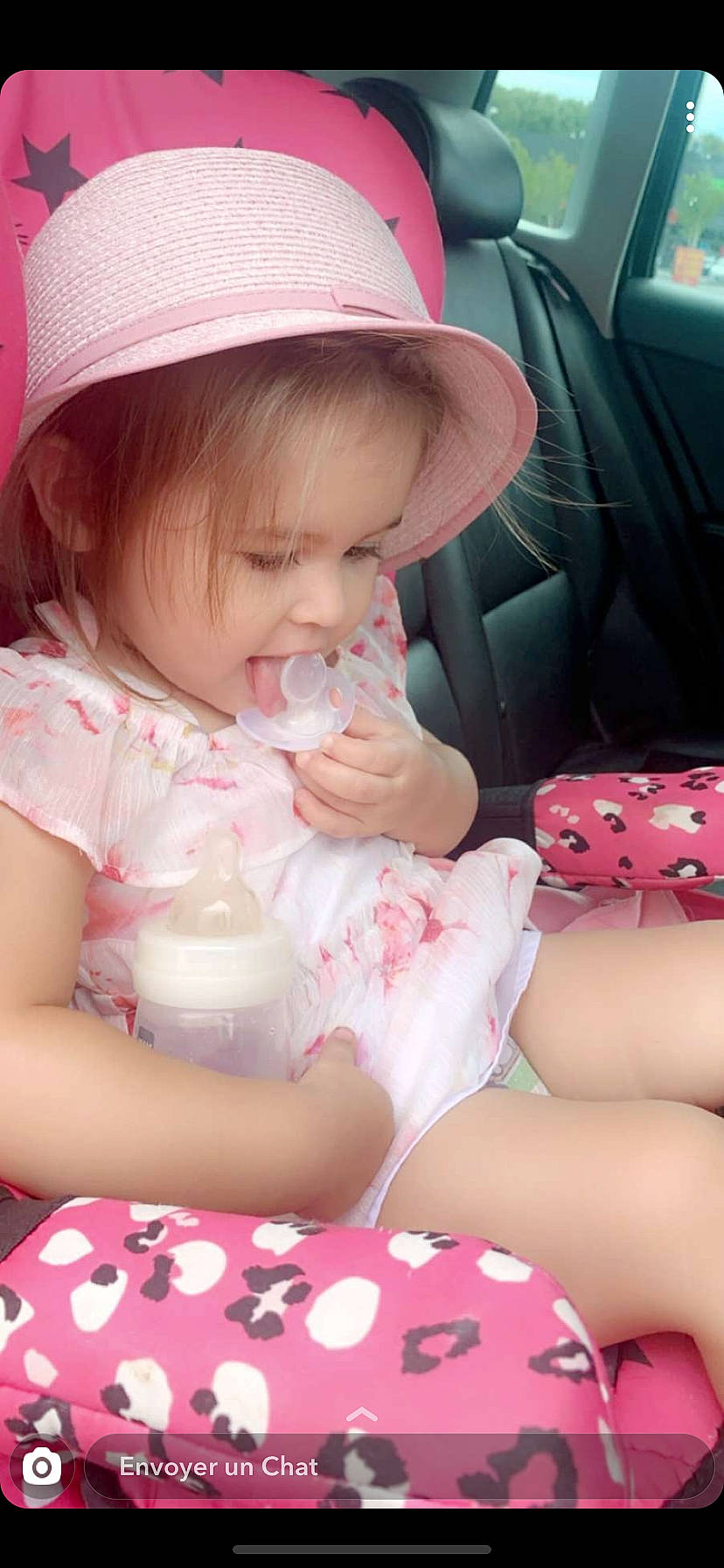 Lena participe au concours pour gagner de l'argent avec cette photo : baby, baby_products, baby_toddler_clothing, cheek, child, finger, hat, headgear, person, pink, product, skin, sun_hat, toddler