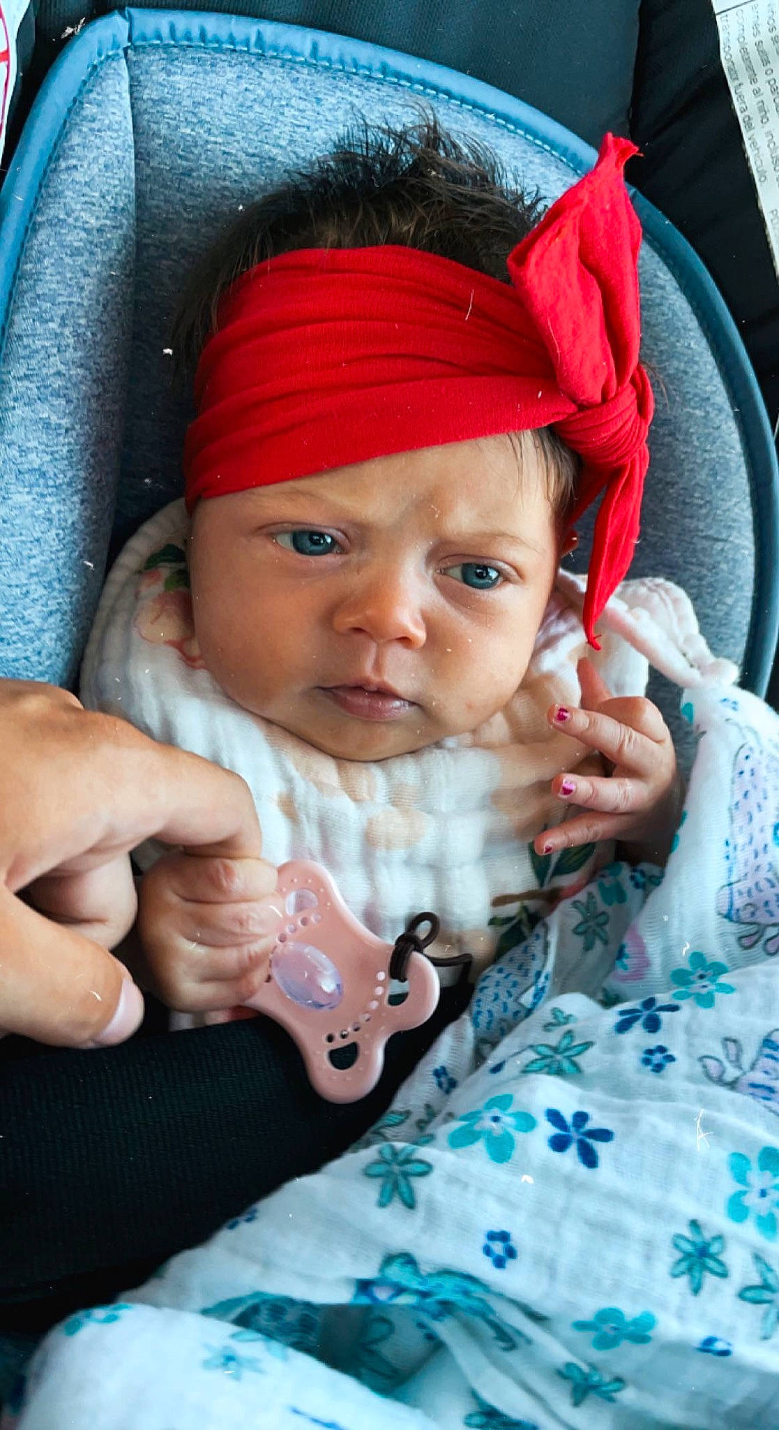 Saige is registered to the contest to win money with this photo: baby, baby_carriage, baby_toddler_clothing, blue, cap, cheek, child, comfort, eyebrow, finger, gesture, head, headwear, iris, lip, mouth, nose, person, pink, product