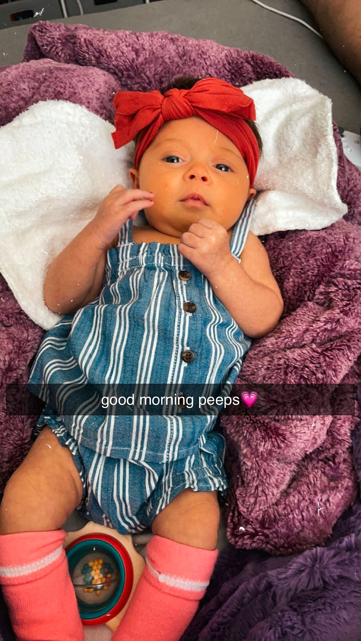 Saige joined the competition — help win amazing prizes! baby, baby_toddler_clothing, cap, cheek, chin, comfort, cool, eye, face, facial_expression, head, headwear, human, human_body, lip, mouth, person, pink, purple, skin