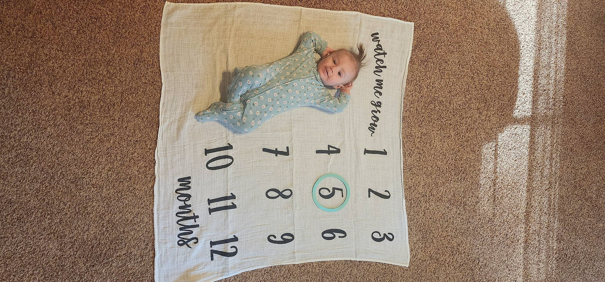 Lorelai is registered to the contest to win money with this photo: art, baby, baby_toddler_clothing, child, comfort, drawing, font, handwriting, illustration, linens, paper, paper_product, pattern, person, poster, rectangle, room, sleeve, t_shirt, toddler