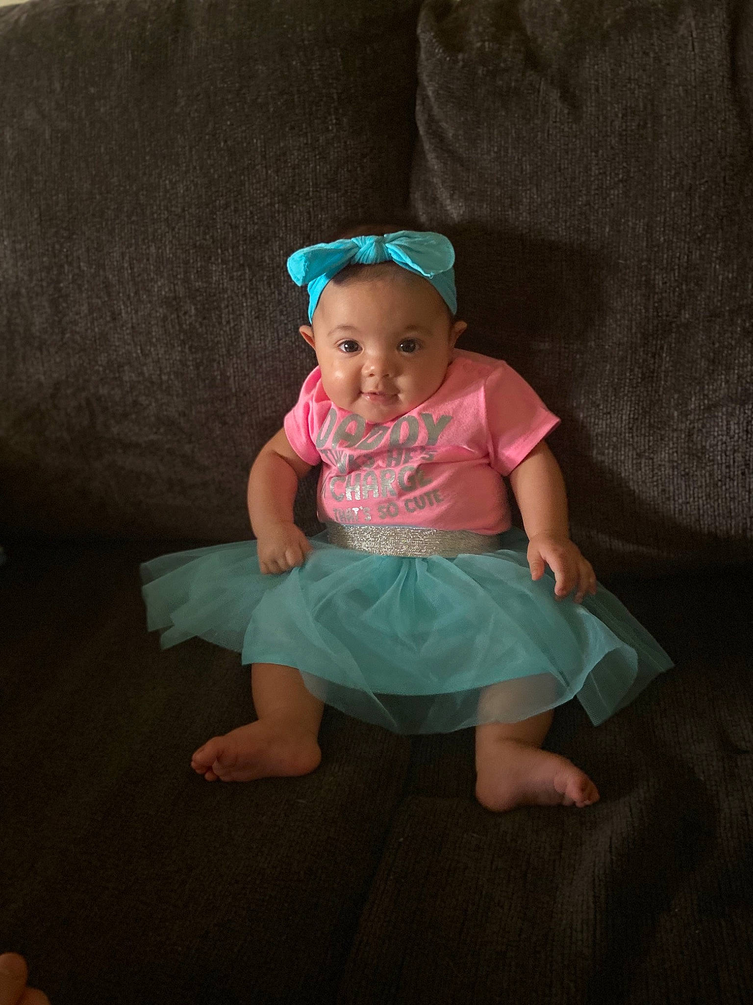 Olyvia is registered to the contest to win money with this photo: baby, baby_toddler_clothing, blue, child, costume, dress, fun, hair_accessory, hand, headgear, person, photography, pink, sitting, skin, smile, toddler, turquoise