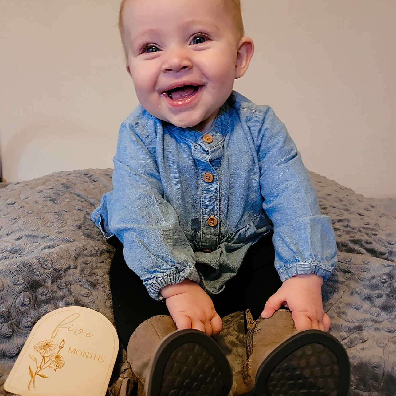Harlin joined the competition — help win amazing prizes! baby, babylaughing, bed, bedroom, clothing, face, footwear, furniture, happy, head, indoors, jeans, laughing, pants, person, photography, portrait, shoe, sitting, smile