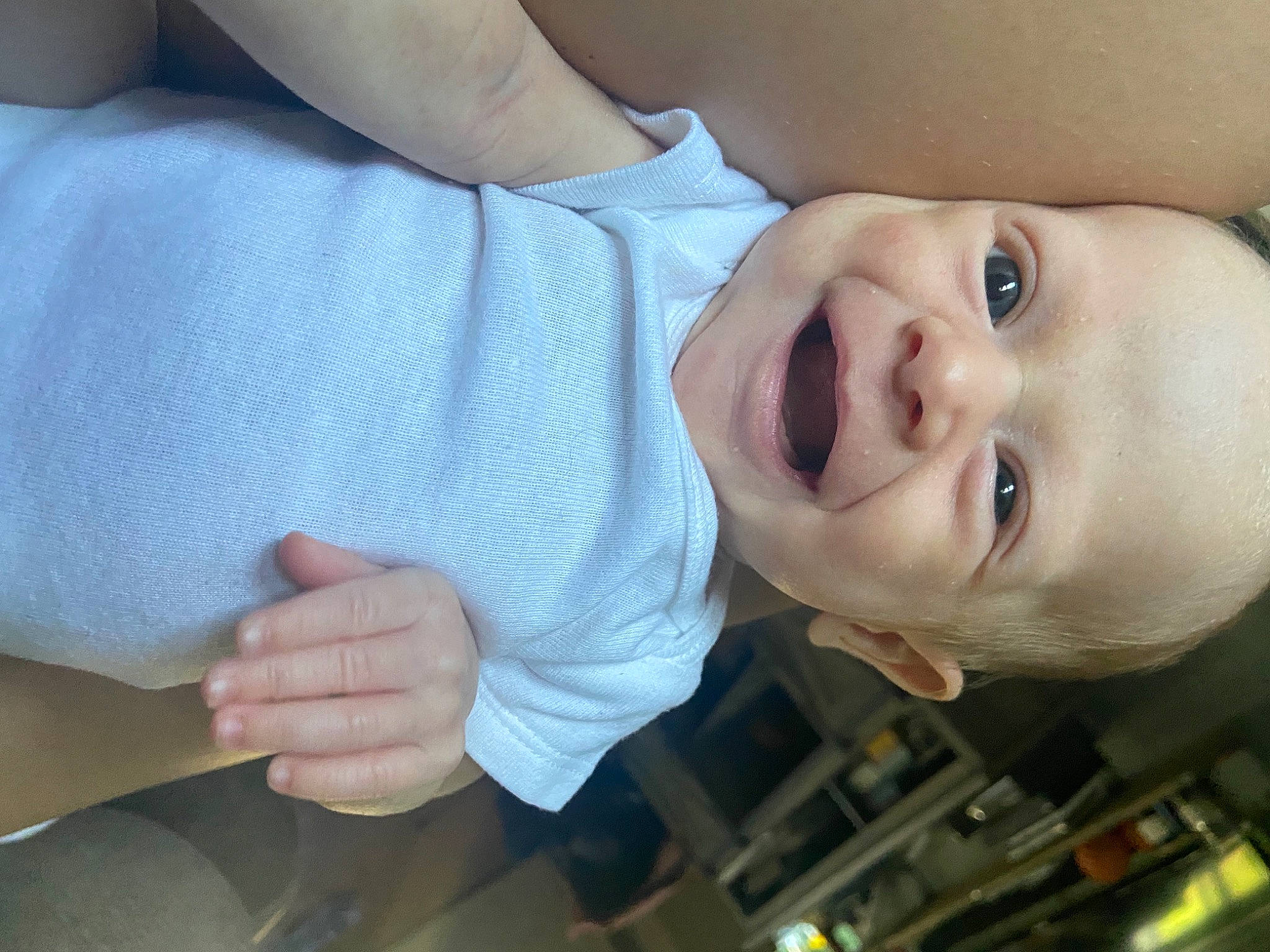Elsie is registered to the contest to win money with this photo: arm, baby, baby_laughing, baby_toddler_clothing, cheek, eyelash, facial_expression, finger, gesture, hand, happy, iris, lip, mouth, nose, person, skin, sleeve, smile, tooth