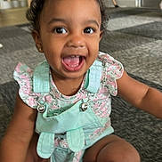 Kai joined the competition — help win amazing prizes! toddler, child, smiling, indoor, carpet, overalls, pink_socks, red_object, happy, cute, baby, person, clothing, floor, hair, eyes, mouth_open, sitting, playful, young_child
