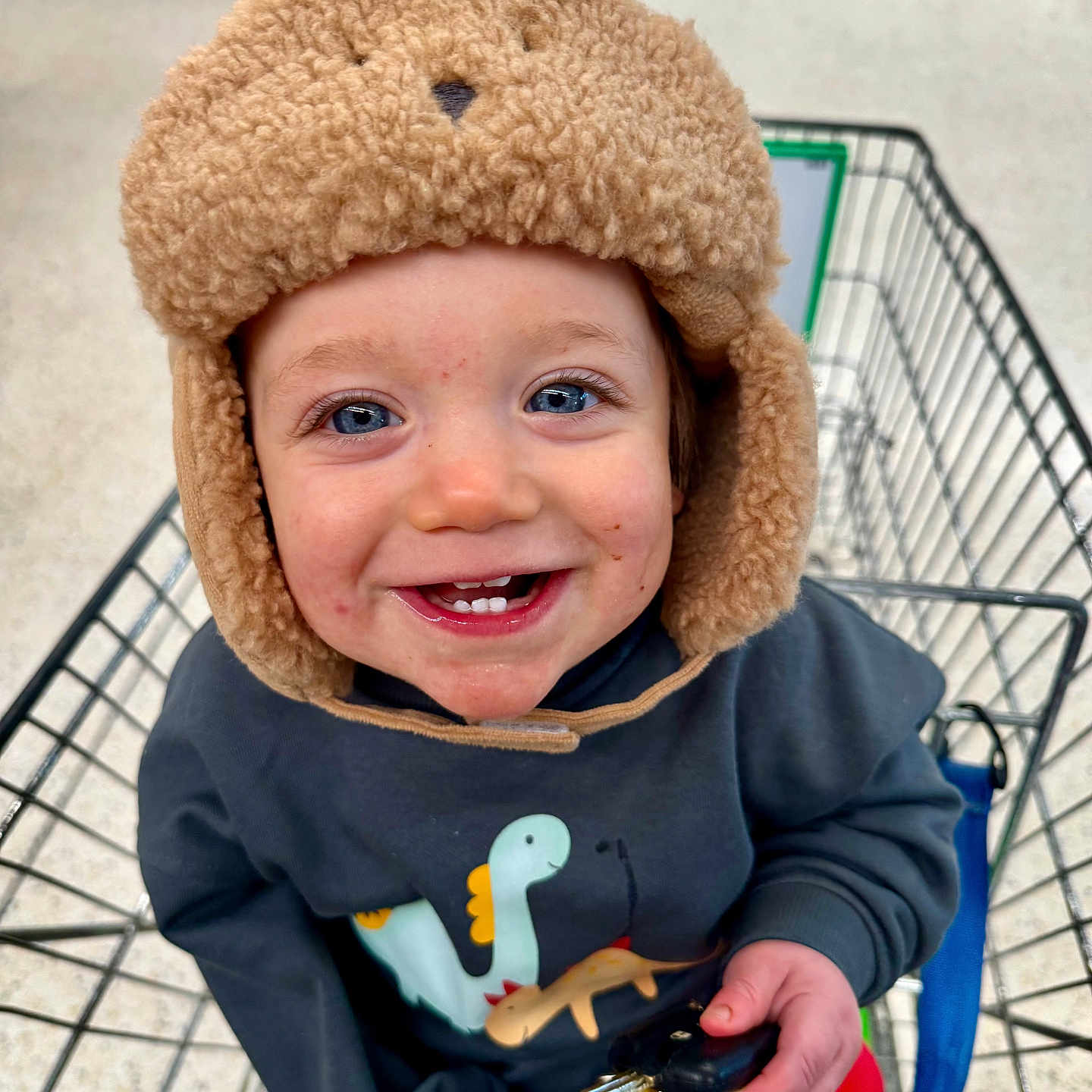Stanley joined the competition — help win amazing prizes! baby, bodypart, cap, clothing, coat, face, finger, hand, happy, hat, head, hood, jacket, laughing, mouth, person, photography, portrait, shoppingcart, smile