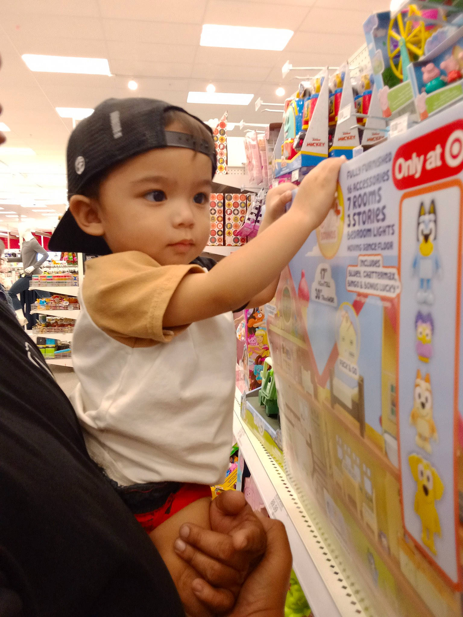 Kade joined the competition — help win amazing prizes! baby, baseball_cap, cap, child, convenience_store, customer, event, fun, hand, headwear, leisure, person, retail, room, service, shelf, supermarket, t_shirt, thumb, toddler