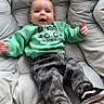 Zachary is registered to the contest to win money with this photo: baby, child, infant, person, clothing, sweatshirt, pants, shoes, footwear, smile, face, arms, cushion, chair, indoor, happy, casual, comfortable, plush, seated
