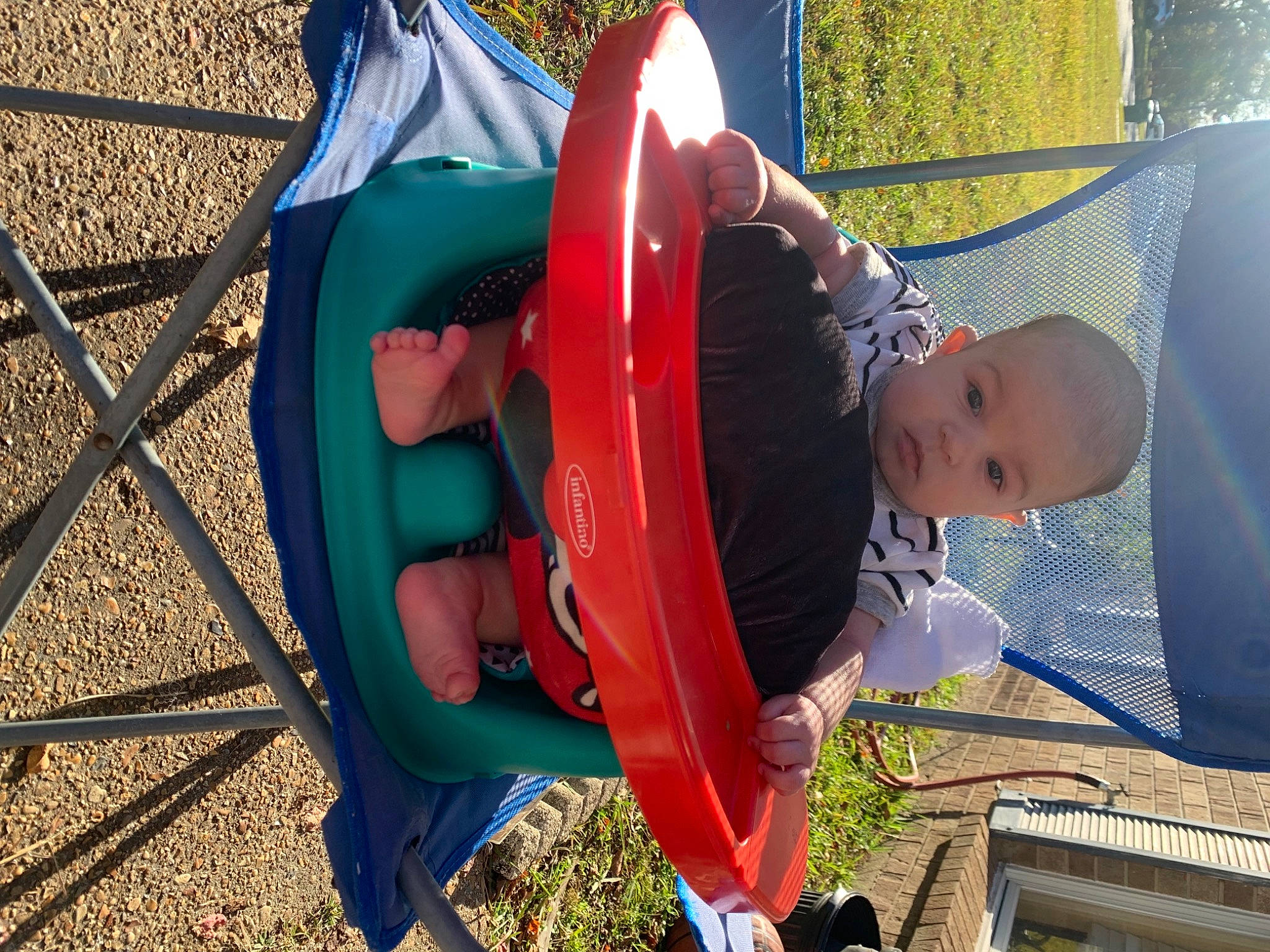 Kaidyn is registered to the contest to win money with this photo: baby, camping, child, chute, city, fun, grass, hat, leaf, leisure, outdoor_play_equipment, person, play, playground, playground_slide, recreation, shade, t_shirt, toddler, tree