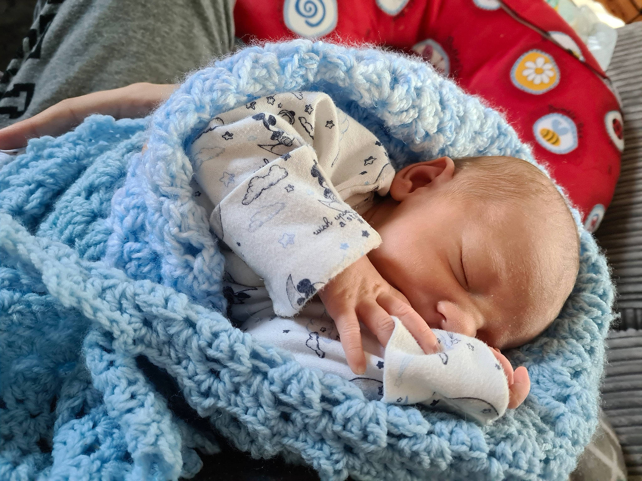 Finnley joined the competition — help win amazing prizes! baby, baby_products, baby_sleeping, baby_toddler_clothing, bedding, bedtime, blue, child, comfort, finger, hat, linens, nap, pattern, person, sitting, skin, sleeve, textile, toddler