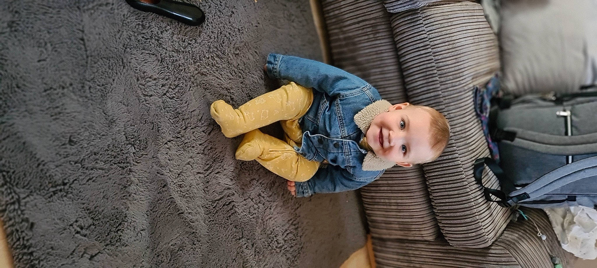 Finnley joined the competition — help win amazing prizes! child, cobblestone, comfort, concrete, denim, flash_photography, flooring, fun, happy, human_leg, joy, leisure, person, portrait_photography, road_surface, shadow, sitting, smile, sneakers, toddler