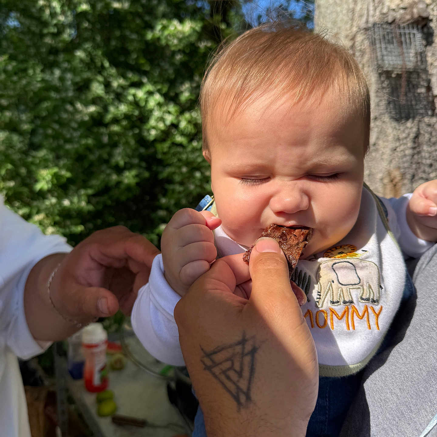 Levi joined the competition — help win amazing prizes! americanfootball, americanfootballball, baby, ball, bodypart, cream, dessert, eating, face, finger, food, football, hand, head, medication, person, pill, skin, sport, tattoo