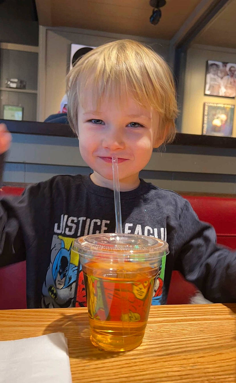 Rory joined the competition — help win amazing prizes! alcohol, alcoholic_beverage, barware, chair, child, distilled_beverage, drink, drinking, drinking_straw, drinkware, food, fun, glass, joy, long_island_iced_tea, person, picture_frame, smile, soft_drink, table