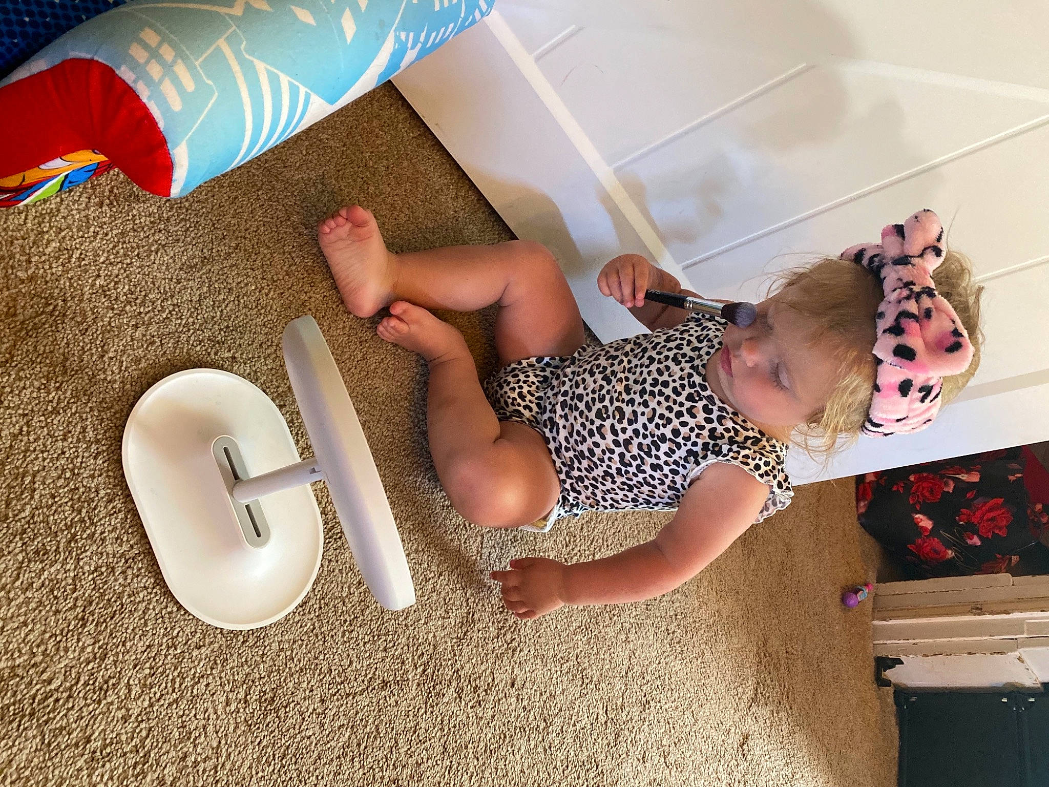 Everleigh is registered to the contest to win money with this photo: arm, baby, baby_toddler_clothing, beauty, child, comfort, design, facial_expression, finger, floor, flooring, fun, hand, happy, human_leg, leg, person, play, product, thigh