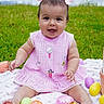 Antonella is registered to the contest to win money with this photo: baby, child, girl, pink_dress, bows, easter_eggs, blanket, grass, outdoor, smiling, happy, sitting, cute, portrait, nature, playful, colorful, holiday, spring, park