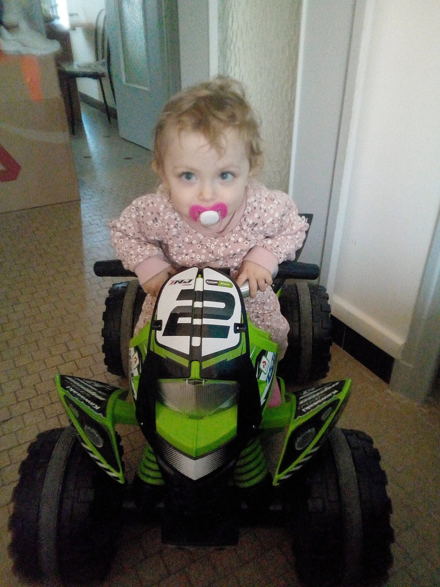 Iliana participe au concours pour gagner de l'argent avec cette photo : auto_part, automotive_design, automotive_exterior, automotive_tire, automotive_wheel_system, baby, baby_toddler_clothing, fender, flooring, motor_vehicle, person, riding_toy, rim, rolling, synthetic_rubber, tire, toddler, toy, tread, vehicle