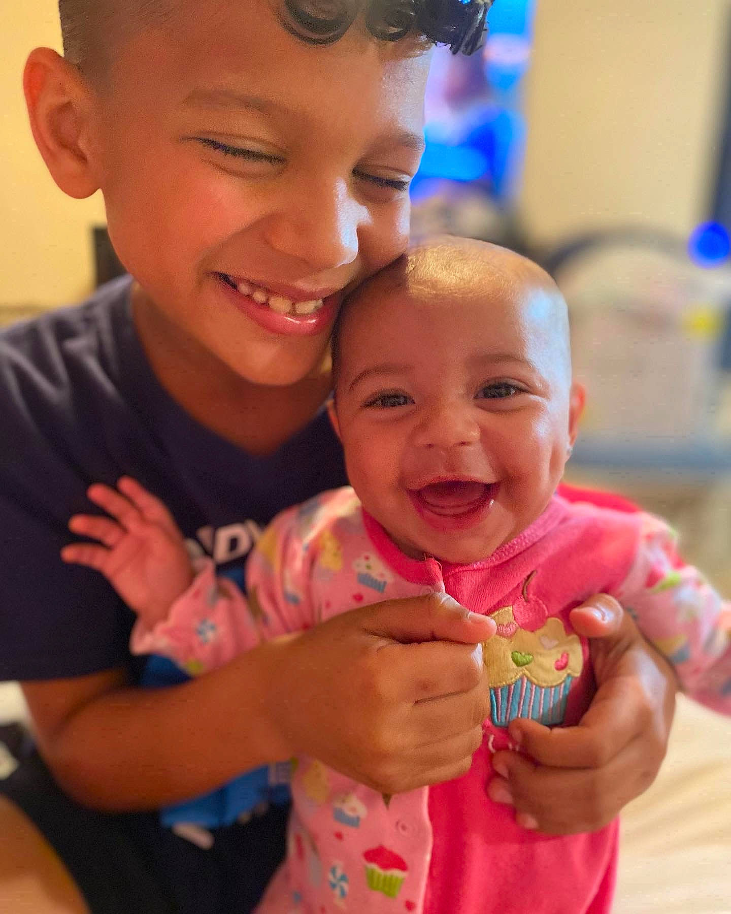 Kalia is registered to the contest to win money with this photo: arm, blue, cheek, eye, face, facial_expression, finger, gesture, hair, hairstyle, hand, happy, head, joy, lip, mouth, nose, organ, person, product