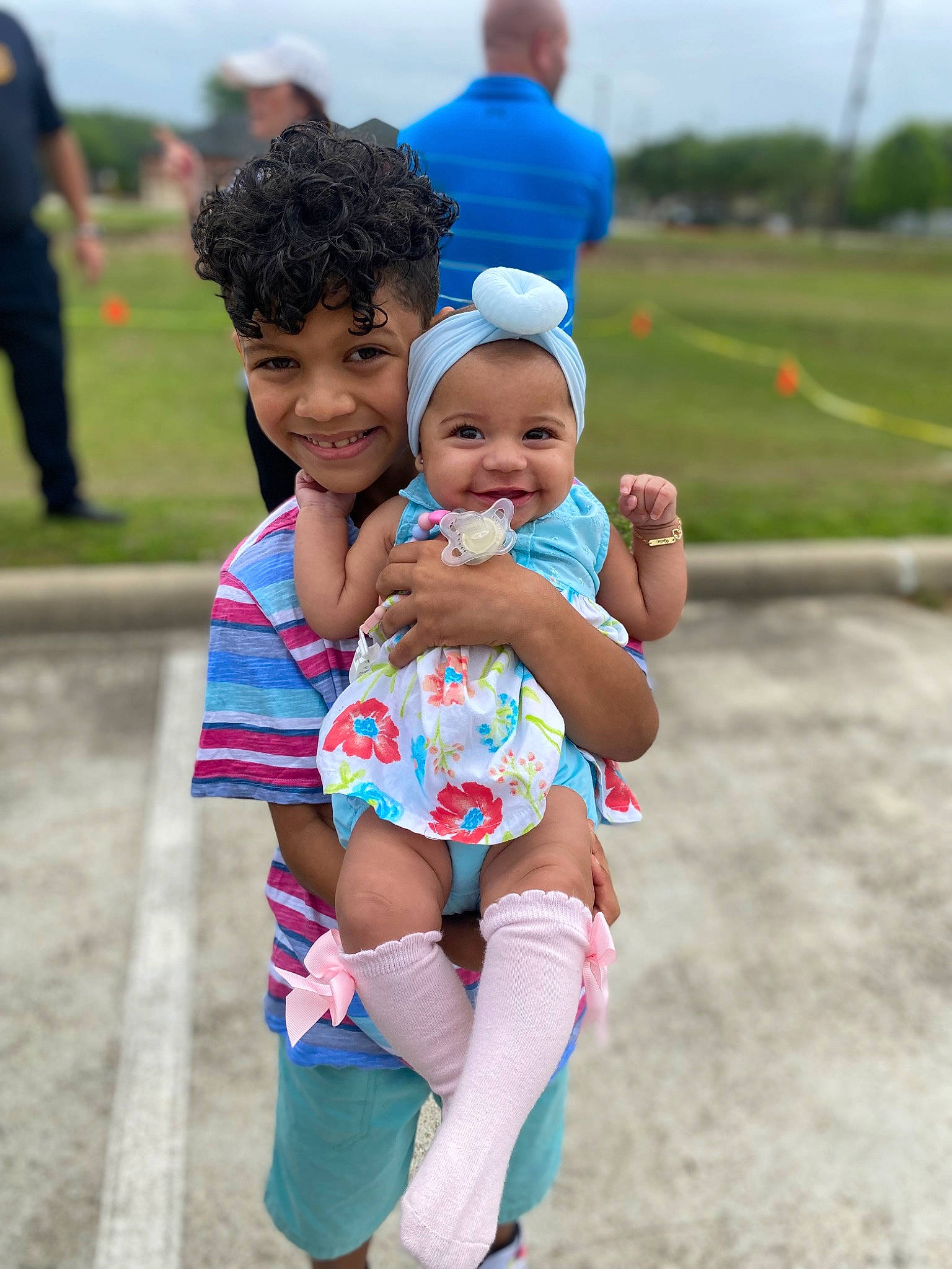 Kalia joined the competition — help win amazing prizes! abdomen, azure, baby, baby_toddler_clothing, electric_blue, event, fun, gesture, grass, happy, hat, joy, leisure, people, person, recreation, sky, smile, summer, thigh