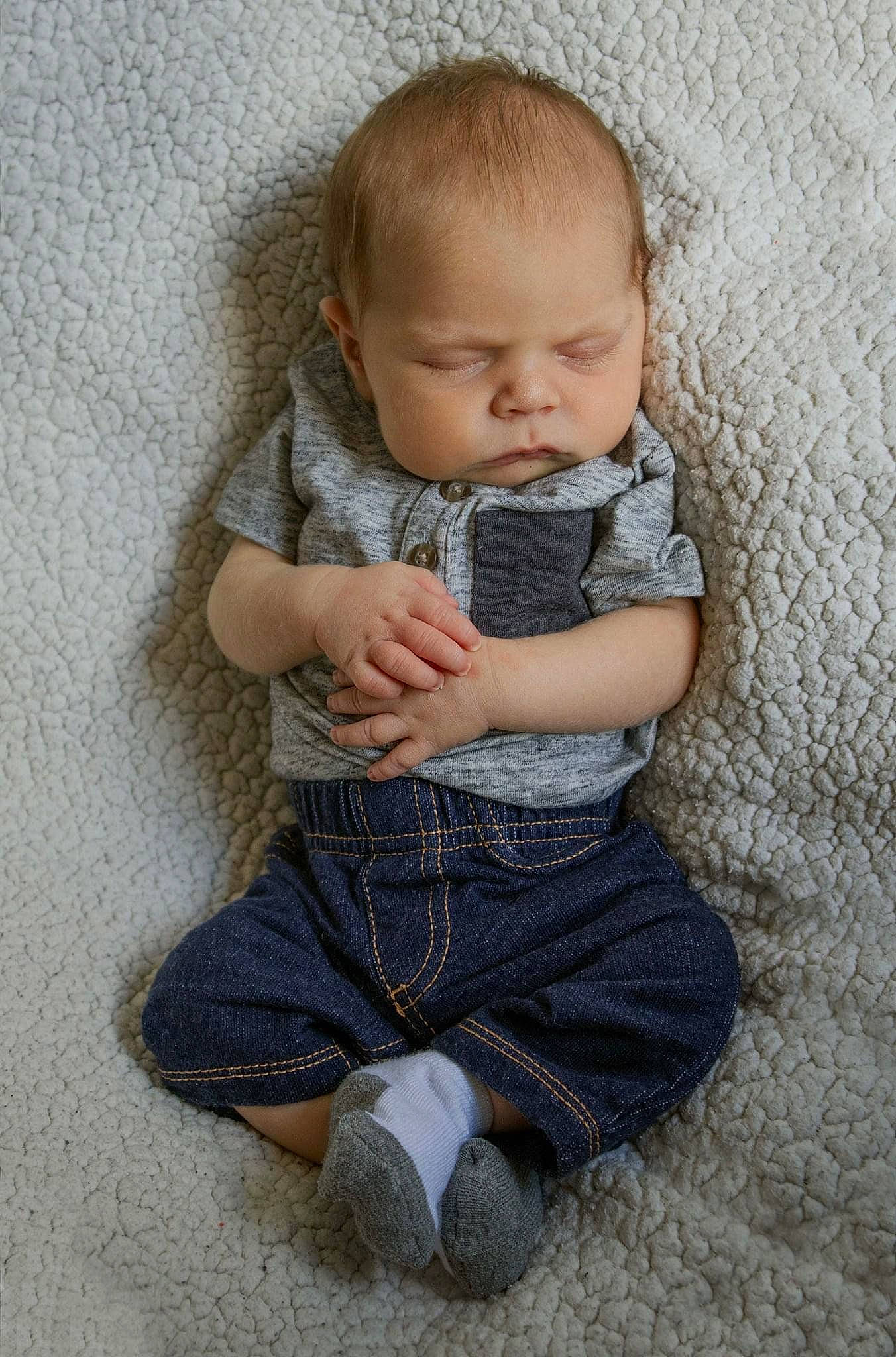 Mikael joined the competition — help win amazing prizes! arm, baby, baby_toddler_clothing, cheek, child, chin, comfort, eye, face, grey, hand, head, human_body, iris, lip, pattern, person, skin, sleeve, t_shirt