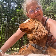 Uly participe au concours pour gagner de l'argent avec cette photo : blanket, canine, cuddling, daytime, dog, forest, glasses, happy, leash, nature, outdoor, pet, portrait, relaxed, selfie, smile, summer, sunlight, trees, woman