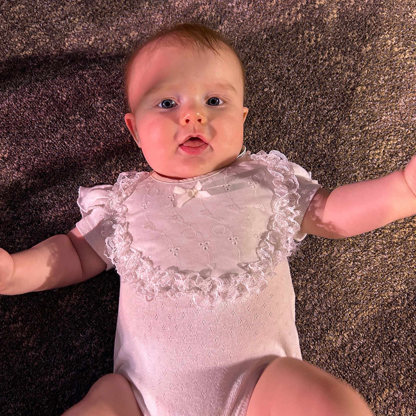 Allison Selah joined the competition — help win amazing prizes! applique, baby, blouse, bodypart, bonnet, clothing, dress, face, finger, hand, hat, head, newborn, person, photography, portrait, sitting, sleeve, toy, undershirt