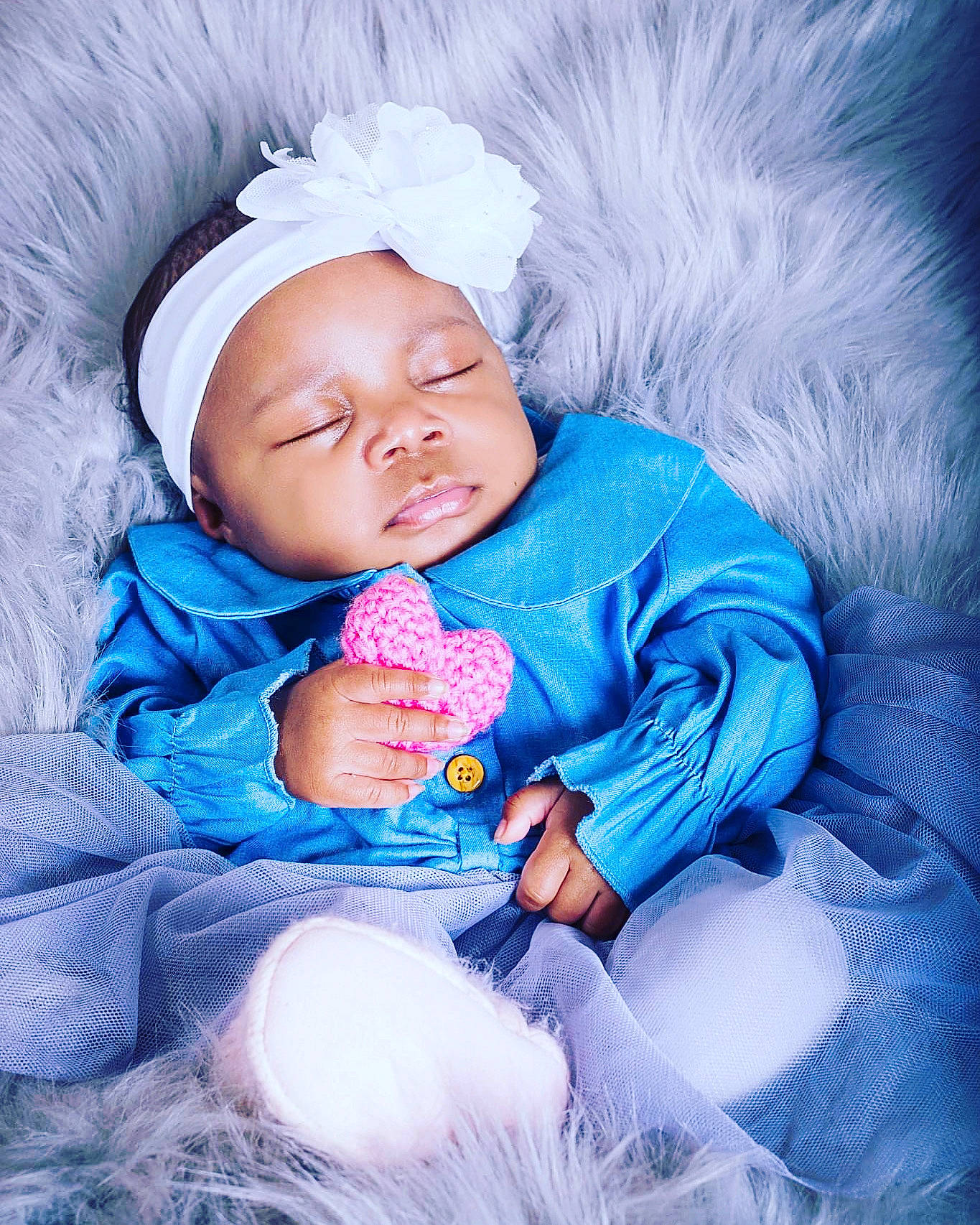 Noirë is registered to the contest to win money with this photo: arm, azure, baby, baby_sleeping, baby_toddler_clothing, cheek, child, clothing, comfort, eye, flash_photography, hand, happy, headwear, iris, lip, nose, outerwear, person, purple